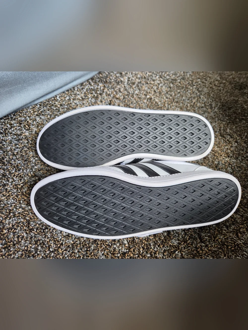 adidas Women’s White Sneakers with Black Stripes and Gold Accents